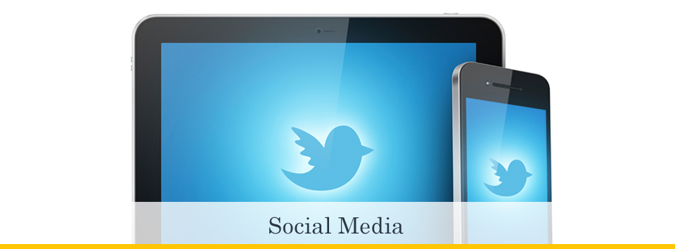 Twitter logo on tablet and phone